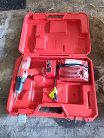 Milwaukee Power Plus Drill and Battery Charger.