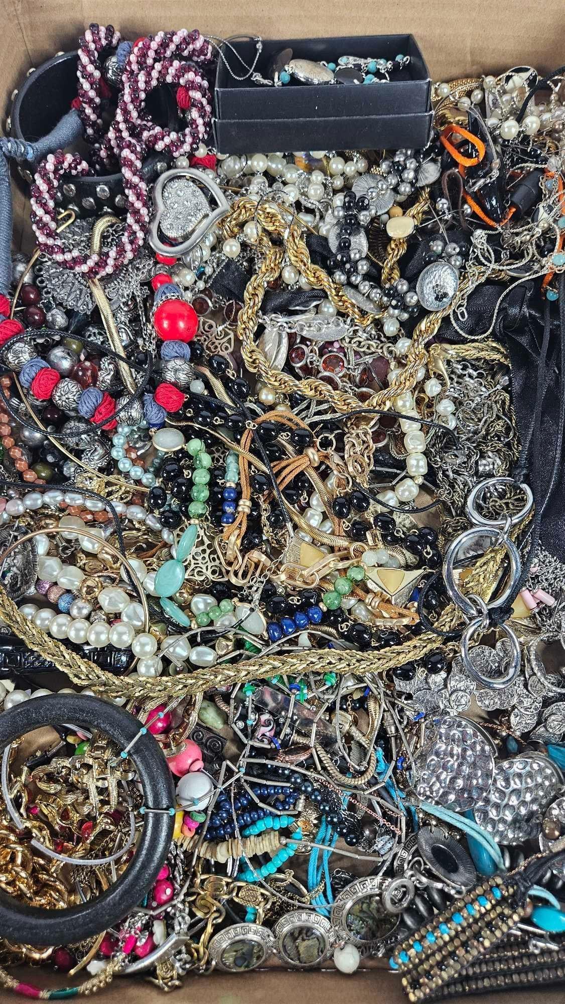 Fantastic Ladies Jewelry Lot: Brooch, bracelets, Necklaces, and more. Includes some shell and mother of pearl pieces. This lot of jewelry has not been thoroughly checked out and may contain gold or silver items.