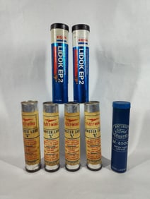 Exxon, FleetWing, and Ford Grease Tubes.