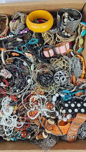 Ladies Cuffs, Necklaces, and Bangle Bracelets: wooden bracelets, beaded and stone jewelry and more. This lot of jewelry has not been thoroughly checked out and may contain gold or silver items.