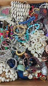 Floral Brooches, Large Statement Necklaces, and Bracelets