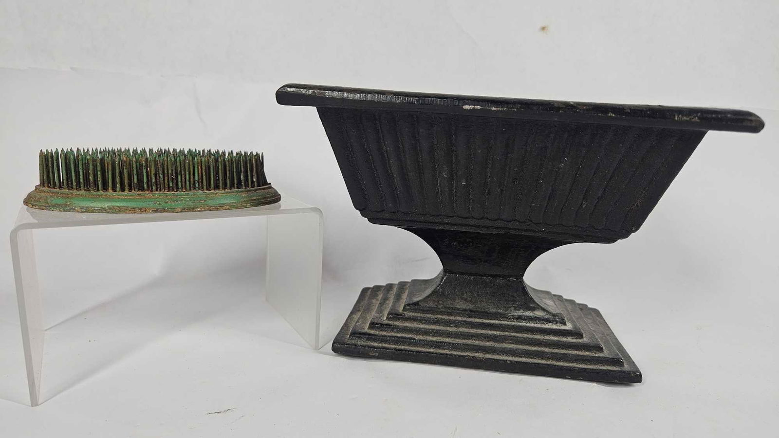 Cast Iron Flower Urn: Minor surface rusting to inside. Flower frog included. 7.5x5x5