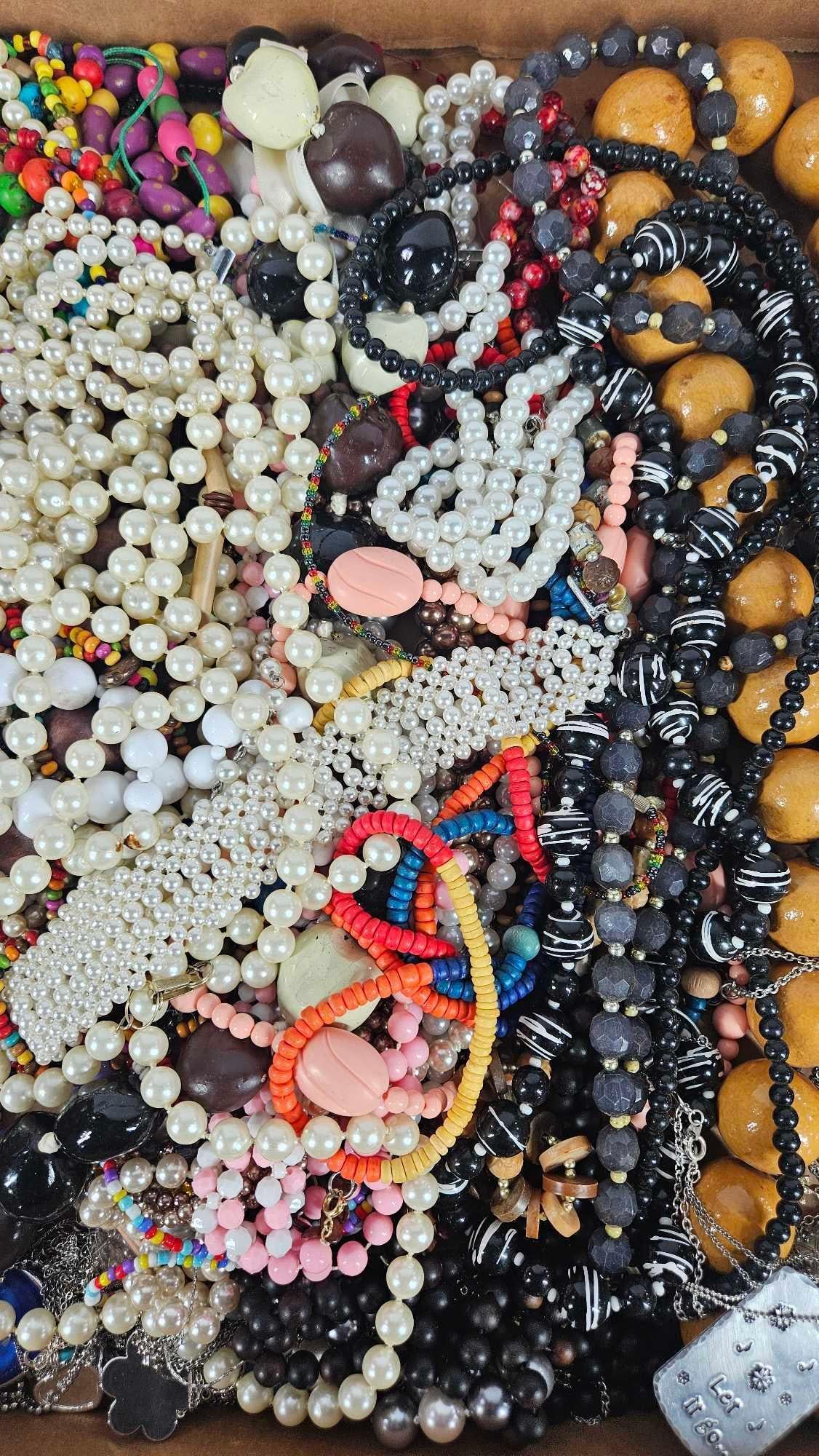 Beaded Necklaces: Including wooden and glass beads, pearls, and more. This lot of jewelry has not been thoroughly checked out and may contain gold or silver items.