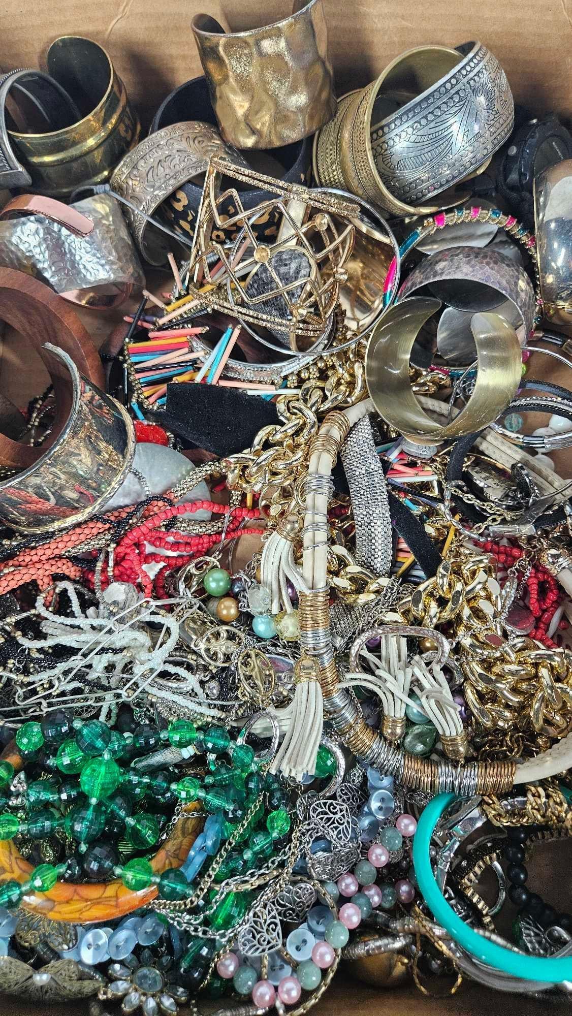 Chains, Wood & Metal Bracelets, and Jewelry: Many great pieces including fashion necklaces, beaded jewelry and more. This lot of jewelry has not been thoroughly checked out and may contain gold or silver items.