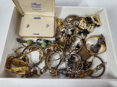Lot of assorted costume jewelry including earrings, necklaces, locket and more inc. sterling silver