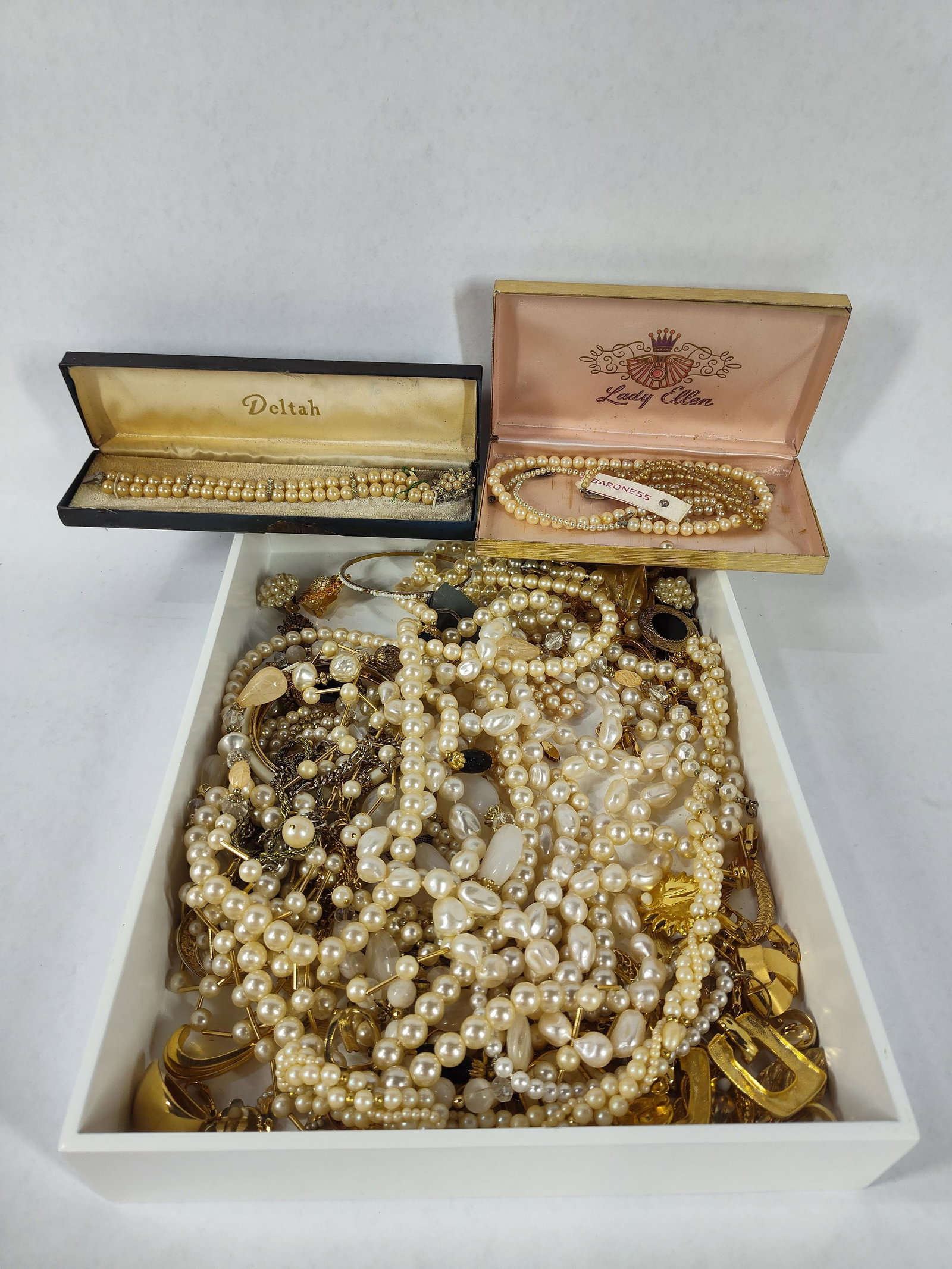 Lady Ellen, Deltah Pearls and gold tone jewelry loaded lot: this lot includes an array of unsorted pearls, earrings and more