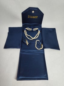 Stauer pearl necklace, bracelet and earrings set in case