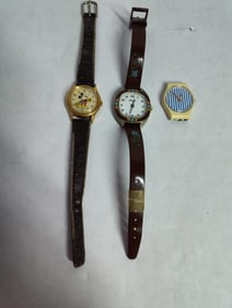Wrist watch lot inc. Mickey Mouse, Marcel and Newport Swatch watch face