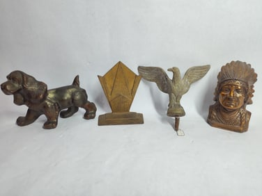 Bronze and brass lot inc. coin banks, bookend and finial Dog, eagle and indian