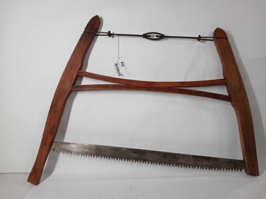 Red stained buck saw