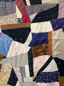 Hand sewn quilted knotted crazy quilt