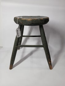 Primitive hand carved painted farm stool