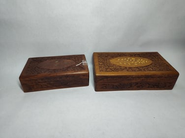 Hand carved wooden lidded boxes with bone inlay