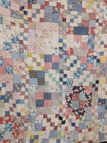 Hand stitched feed sack block quilt