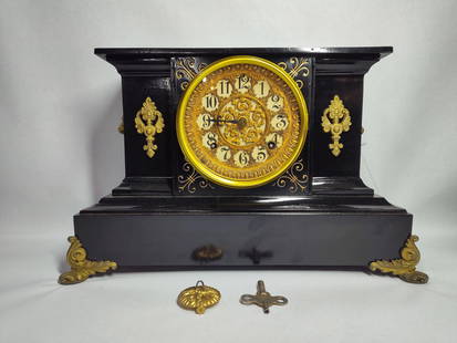 Black Slate gilded Ansonia ornate footed mantel clock: no chips cracks or breaks and includes key and pendulum?10.5 x 15