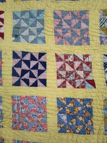 Hand stitched tufted Windmill block feed sack quilt w/ floral ribbing