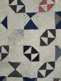 Hand stitched hour glass and bow tie quilt