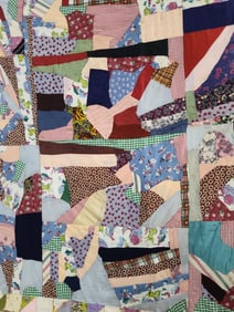 Hand stitched reversible flannel back scrap strip quilt