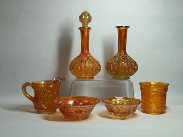 Carnival/ Imperial marigold glass lot including decanters, bowls, dish and pitcher