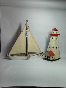 Nautical lot inc. Tin painted tealight light house & Wood and canvas deco sail boat