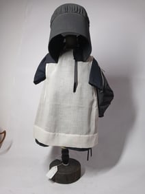 Farmhouse tabletop child dress form displaying Child's Amish dress and bonnet