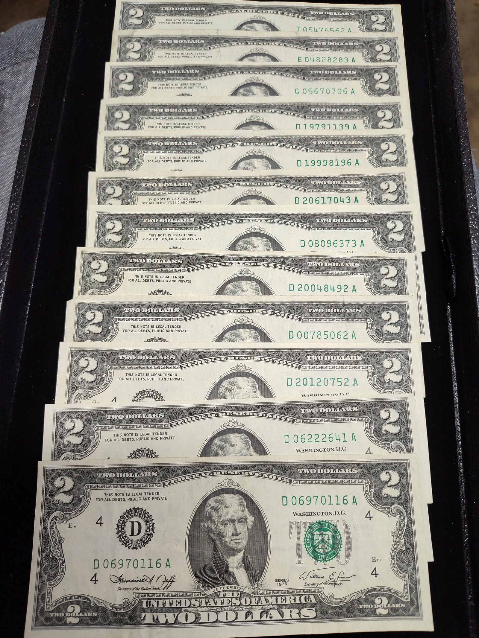 Lot of 12 / 1976 US Two Dollar Notes inc. D, E, I, G (1 of 3)