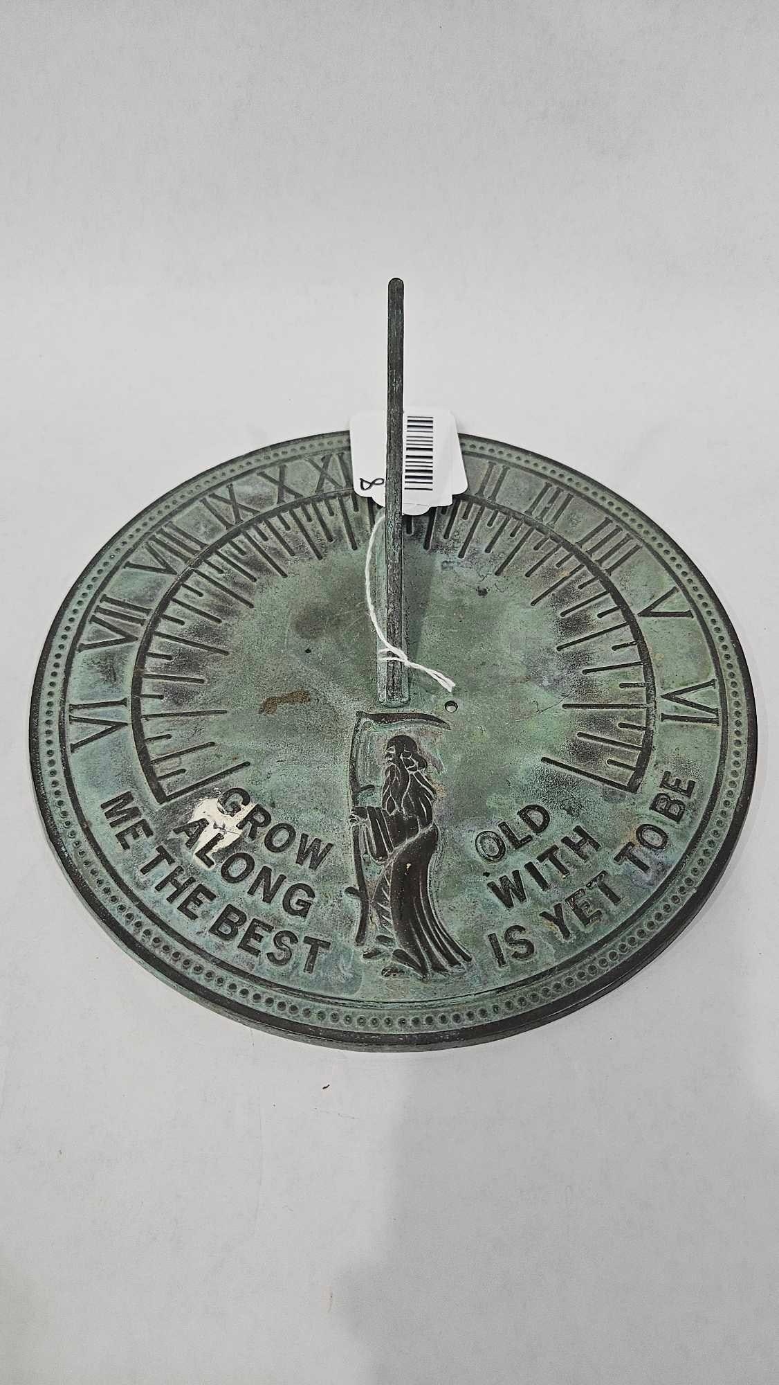 Brass Grow Old with Me Sundial: 9.5 inches in diameter. Heavy metal with some oxidization.