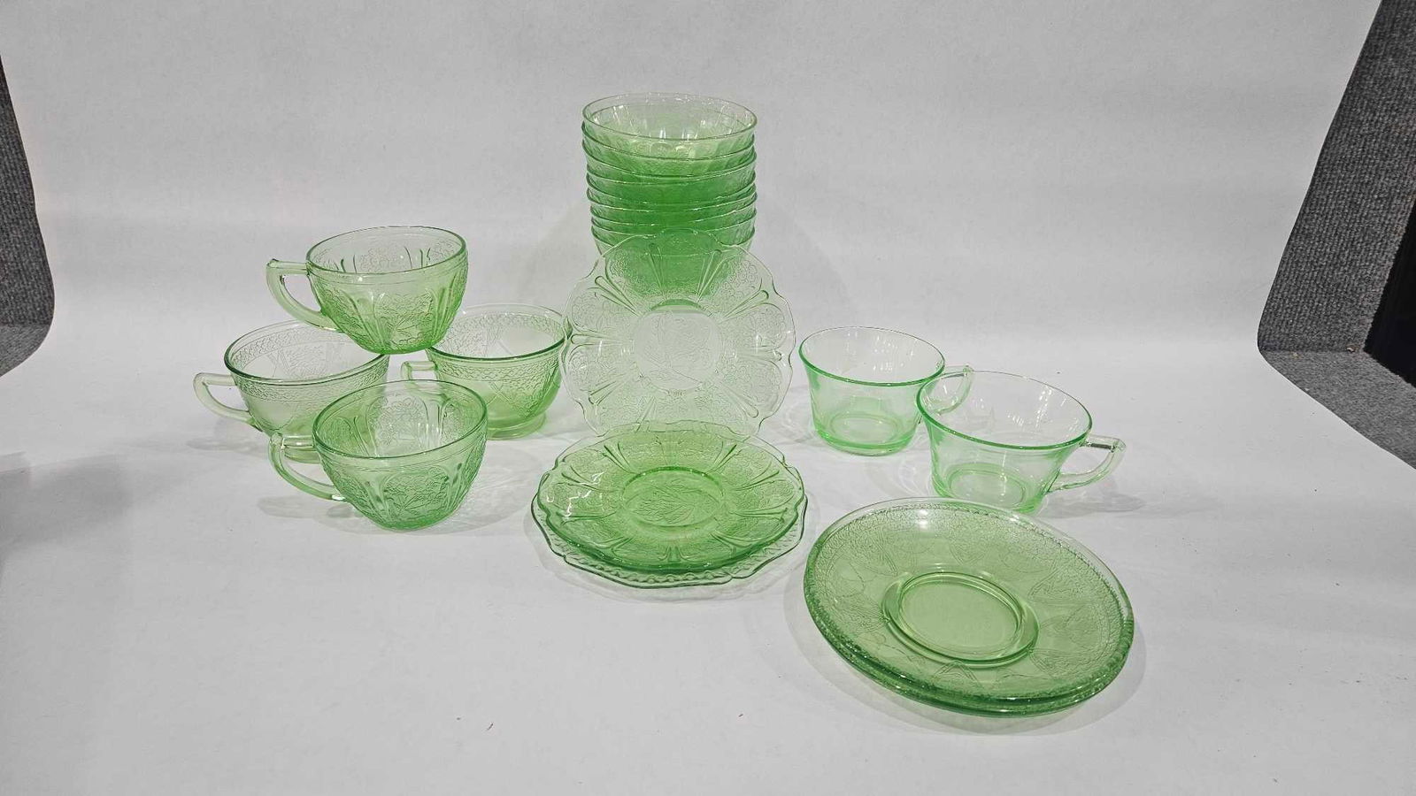 Uranium Glass Cups & Dishes: Includes tea cups, saucers, and fruit bowls. Several different patterns. All glow very bright under UV light.