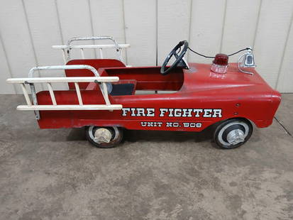 AMF Fire Fighter Pedal Car: Unit 508, Olney Illinois. Wooden ladders and bell included. Seat is coming loose from car but is intact and can be reattached. 44 inches long. Some spotting to car.