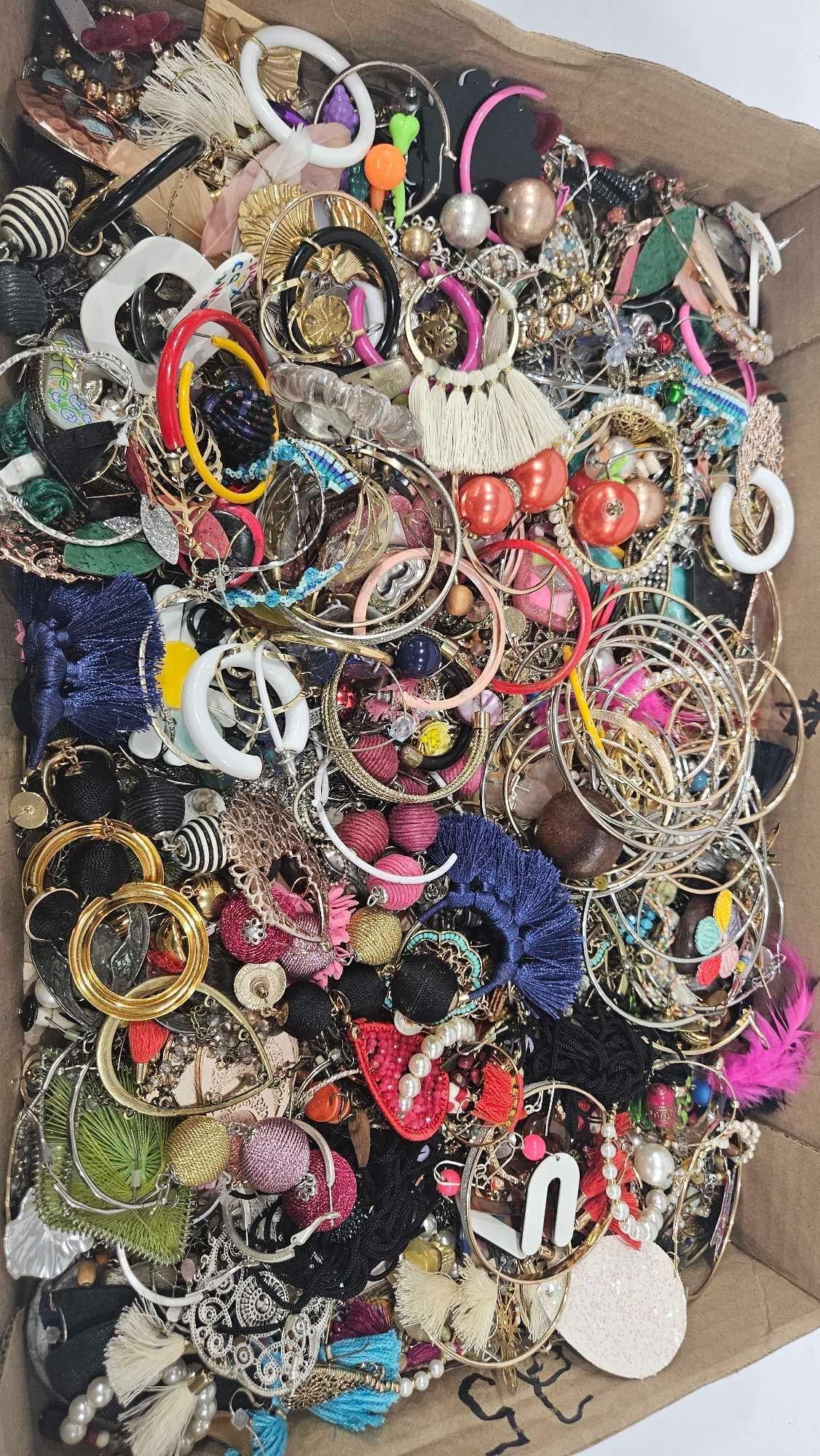 Tons of Ladies Fashion Earrings: Many unique pairs including string jewelry, metal, beaded, and more