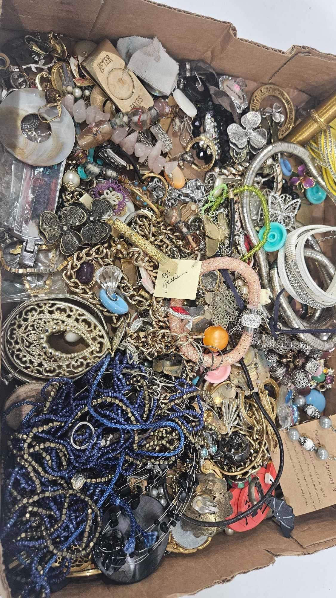Earrings, Snake Bracelet, Beads, and Jewelry: Older and newer pieces.