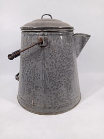 EARLY CHUCKWAGON ENAMELED GRANITE HANDLED AND LIDDED COFFEE POT