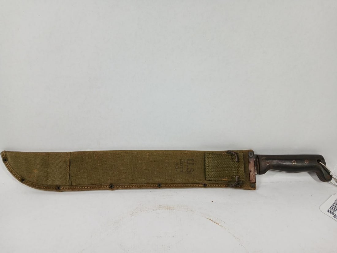 US Collins & Co Machete: Dated 1945. Nylon sheath is also stamped US. Blad does show some surface rusting. 23 inches