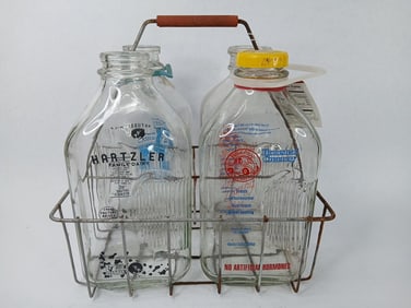 Half gallon milk bottles and wire carrier