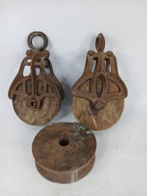 Cast and wooden barn pulleys
