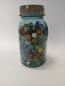 Blue glass Ball jar with marbles