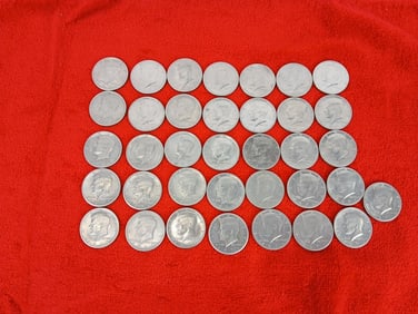 36 Kennedy half dollars