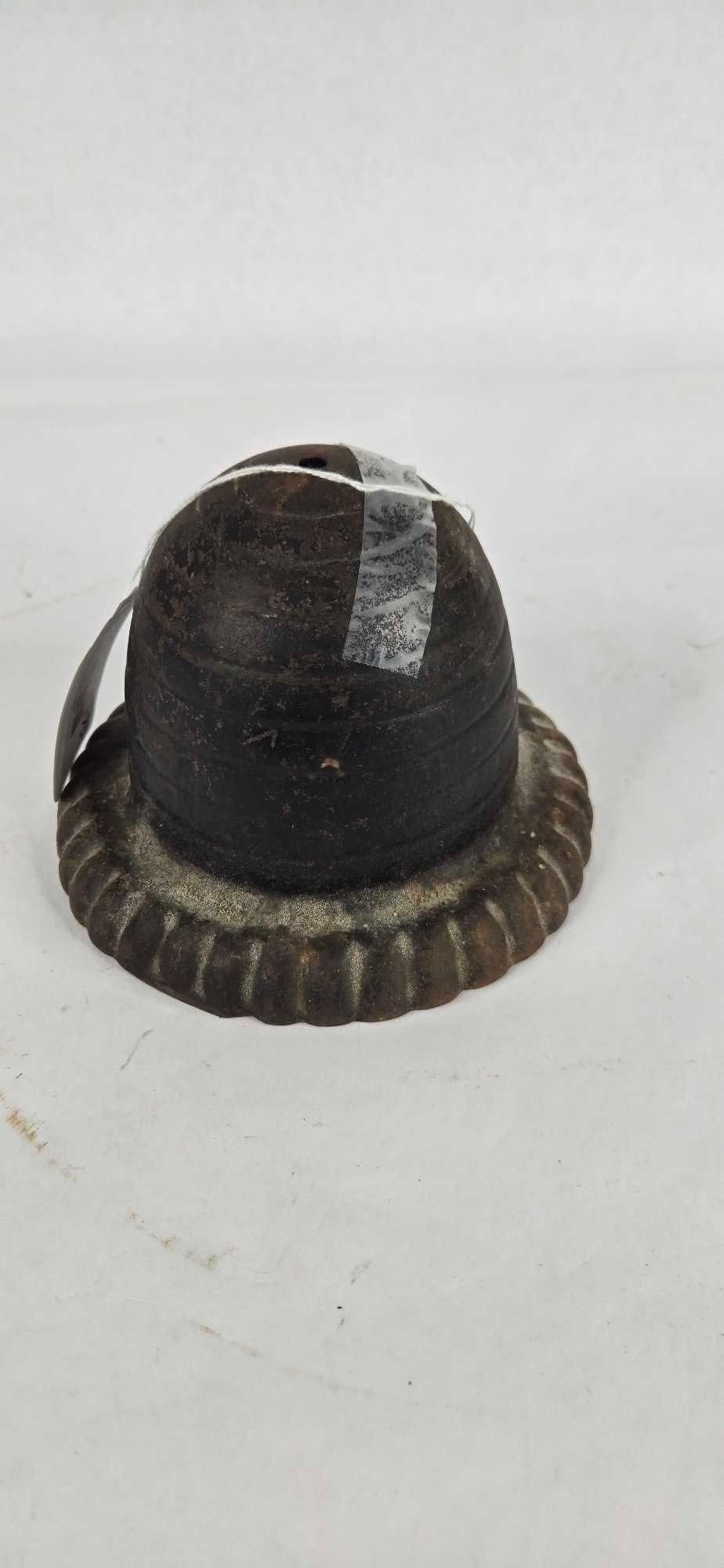 Cast iron beehive string holder: .