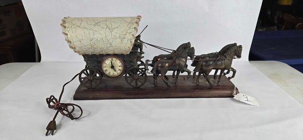United clock covered wagon with bronze horses