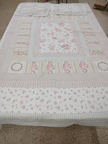 Floral embroidered and hand stitched quilt and pillow cases