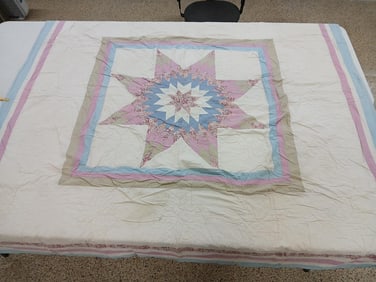 Hand stitched lone star quilt
