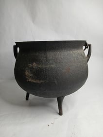 Cast iron unmarked footed kettle