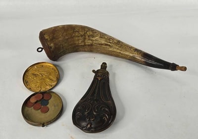 1897 engraved powder horn. Brass gun powder flask and brass trinket box.