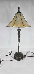 Cast iron table lamp with iridescent stained glass shade