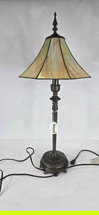 Cast iron table lamp with iridescent stained glass shade: 31 in tall in good working condition