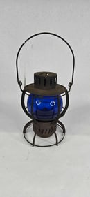 Unmarked railroad lantern with blue globe