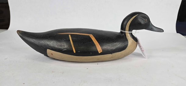 Hand-Carved and hand-painted weighted duck decoy with glass eyes