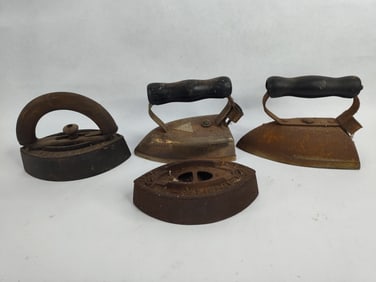 2 sad irons and 2 vintage electric irons