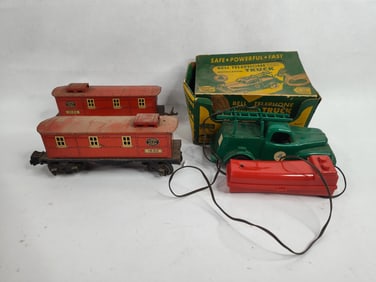 Remote control bell telephone truck and 2 lionel train cars
