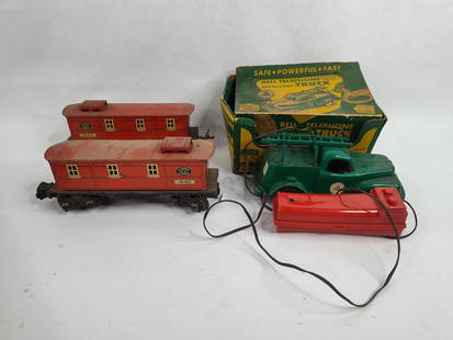 Remote control bell telephone truck and 2 lionel train cars: .